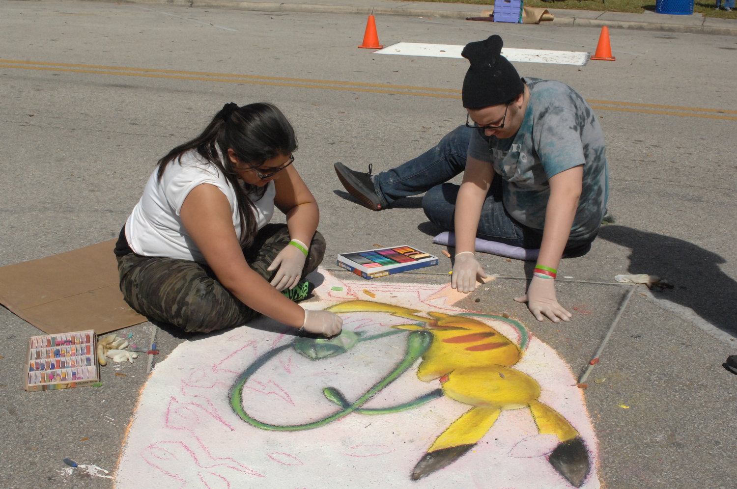 The Top of the Lake Art Festival includes chalk art.